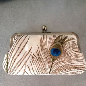 Peacock feather embroidered clutch
